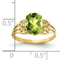 9-karatni prsten od žutog zlata s ovalnim peridotom i dijamantnim dijamantom.